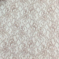 Un gros plan de la dentelle extensible multicolore de Longan Craft France montre son délicat motif floral et sa texture fine, parfaite pour la lingerie, les jupes et les vêtements. Disponible au mètre : Tissu dentelle extensible au mètre.