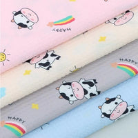 Tissu imprimé vache 100 % polyester au mètre