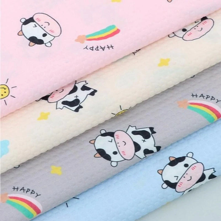 Tissu imprimé vache 100 % polyester au mètre