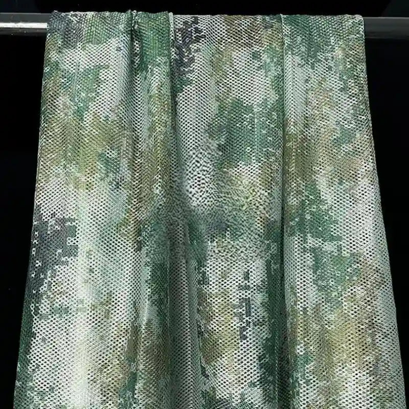 Tissu filet camouflage coloré au mètre