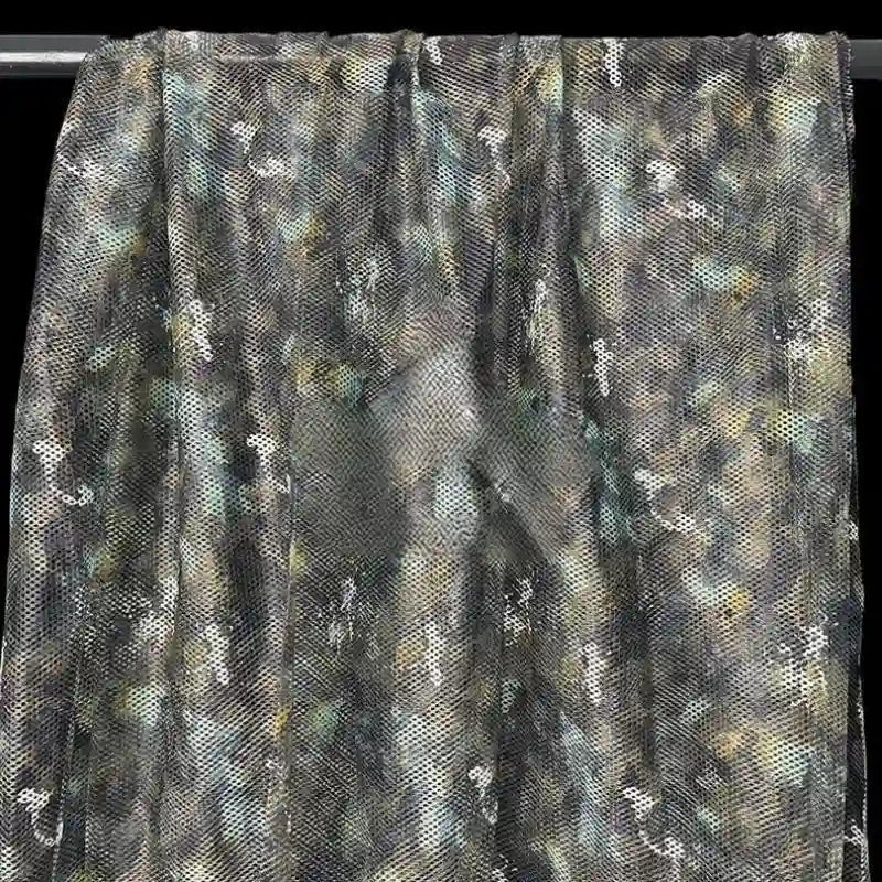 Tissu filet camouflage coloré au mètre