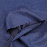 Gros plan sur le microsuède polyester multicolore au mètre de Longan Craft France, montrant sa douce texture peau de pêche brossée-idéal pour vêtements et décoration.