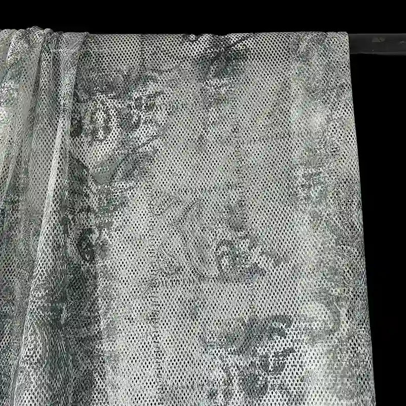 Tissu filet camouflage coloré au mètre