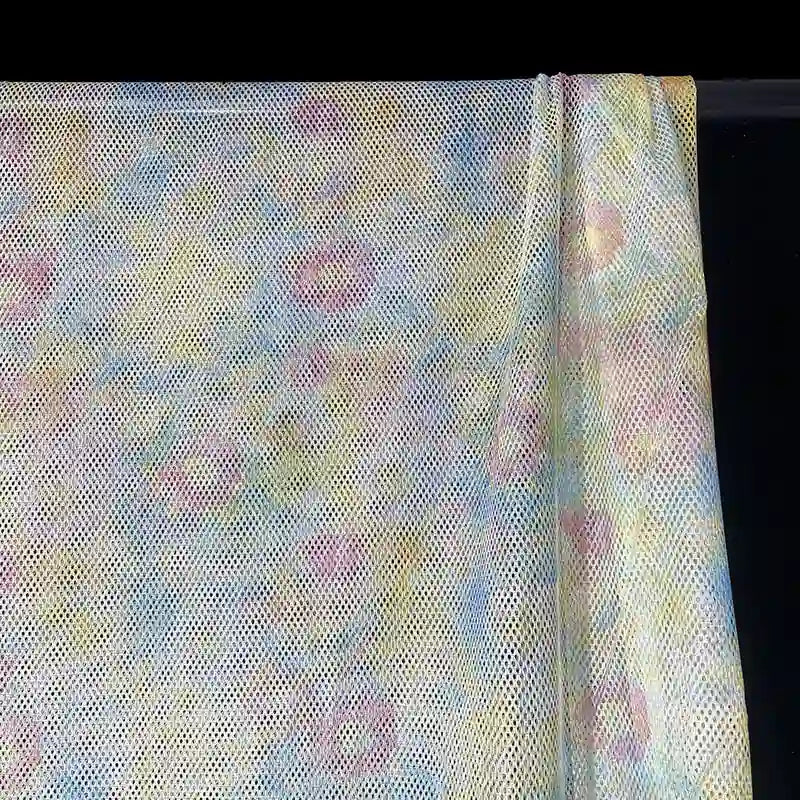Tissu filet camouflage coloré au mètre