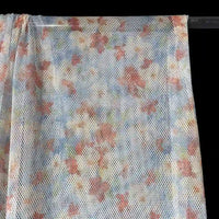 Tissu filet camouflage coloré au mètre