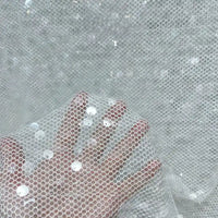 Tissu tulle à sequins au mètre