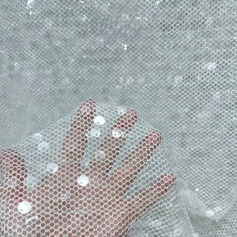 Tissu tulle à sequins au mètre