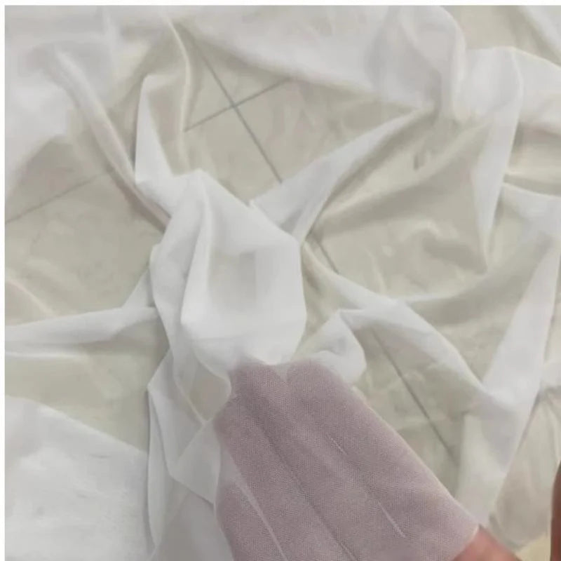 Tissu mesh extensible au mètre