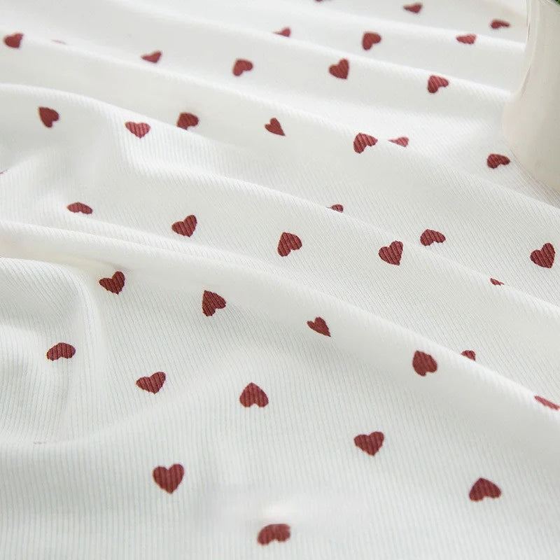 Tissu côtelé imprimé cœur 2x2 au mètre