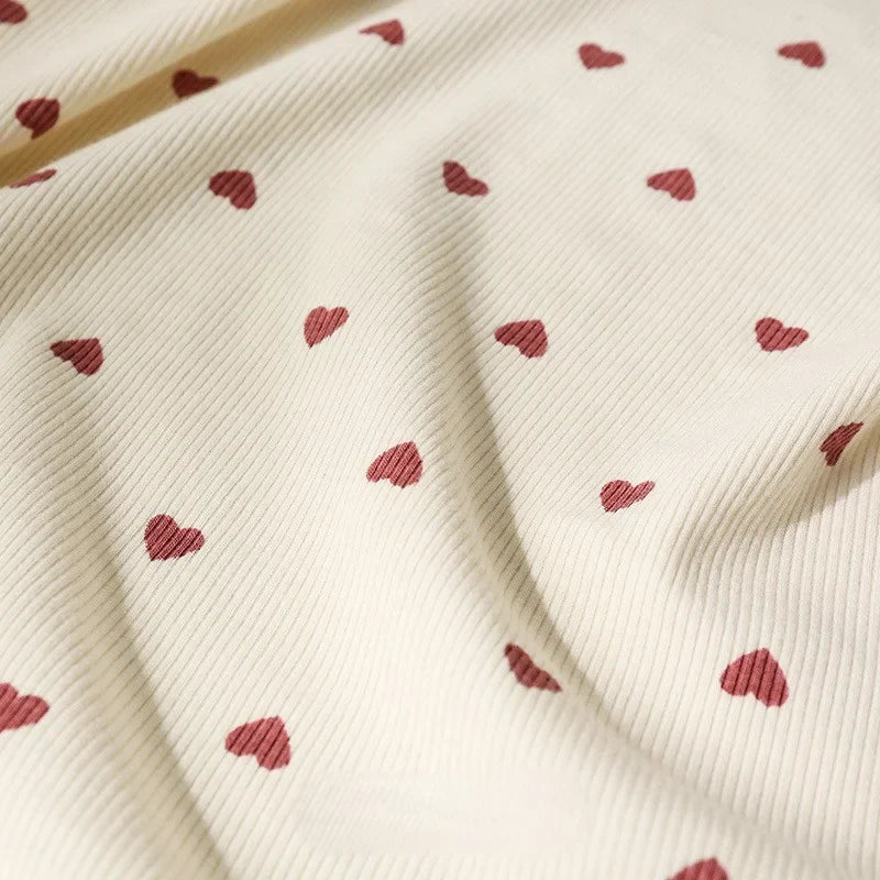 Tissu côtelé imprimé cœur 2x2 au mètre