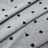 Tissu côtelé imprimé cœur 2x2 au mètre