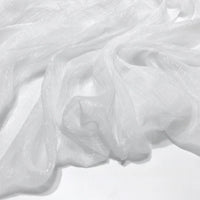 Le Tissu mousseline plissé brillant de Longan Craft France est un tissu polyester léger, froissé et subtilement brillant, parfait pour une tenue de soirée élégante. Drapée librement, ses plis semi-transparents mettent en valeur sa texture raffinée.