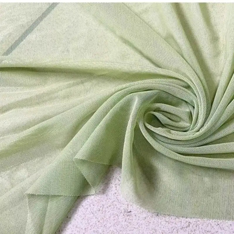 Tissu mesh extensible au mètre