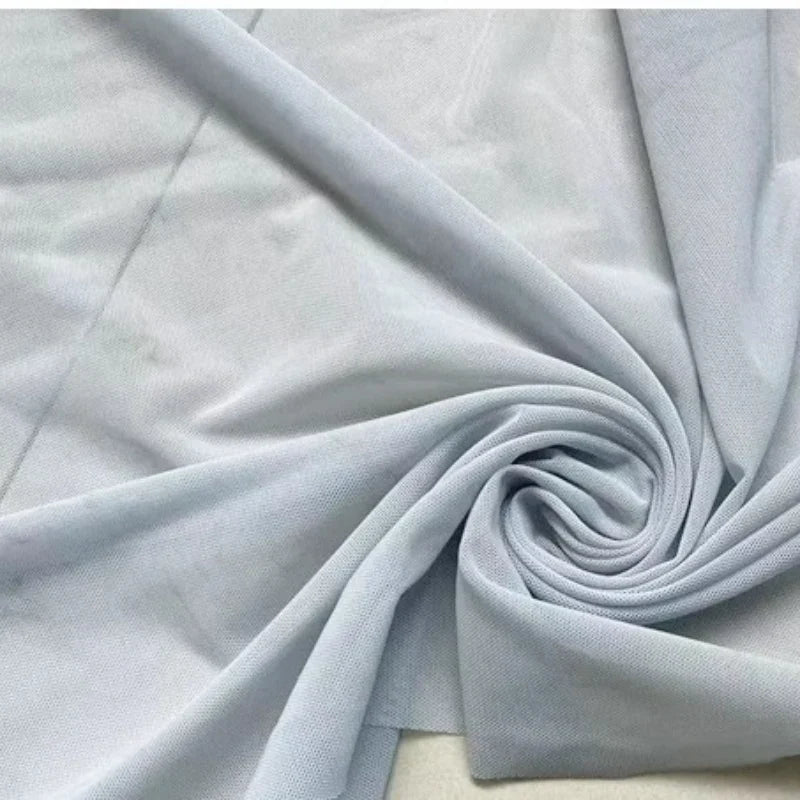 Tissu mesh extensible au mètre