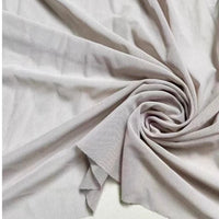 Tissu mesh extensible au mètre
