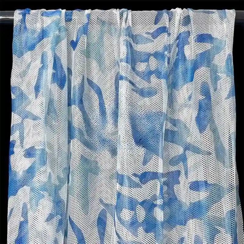 Tissu filet camouflage coloré au mètre