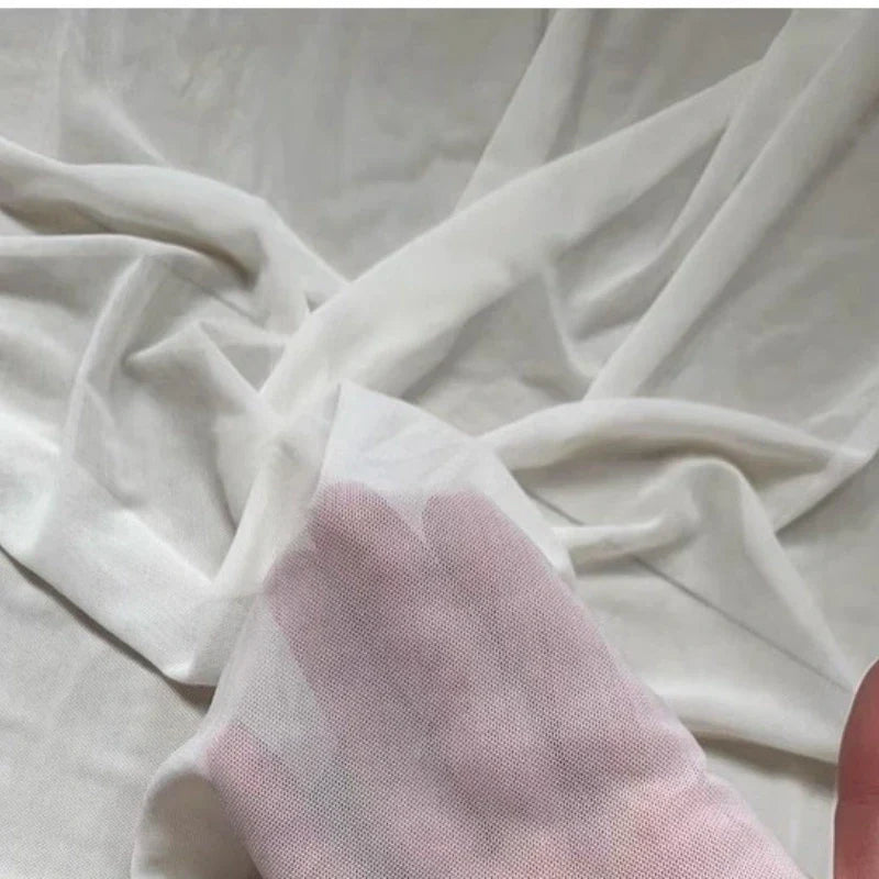 Tissu mesh extensible au mètre