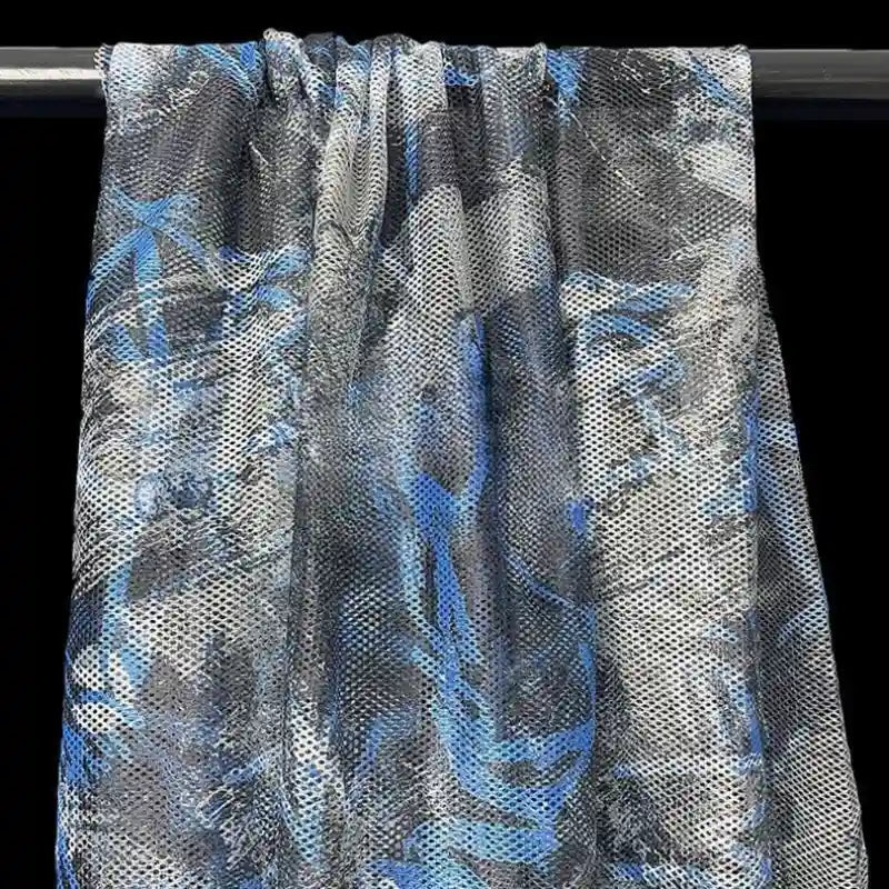 Tissu filet camouflage coloré au mètre