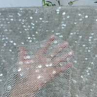 Tissu tulle à sequins au mètre