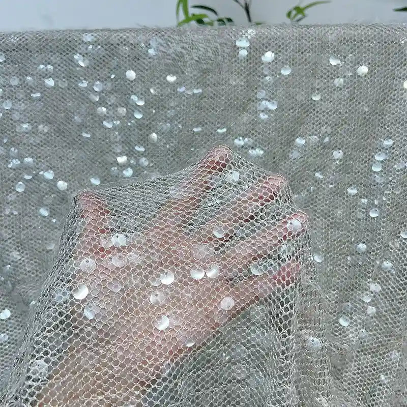 Tissu tulle à sequins au mètre