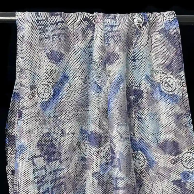 Tissu filet camouflage coloré au mètre