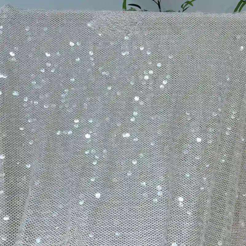 Tissu tulle à sequins au mètre