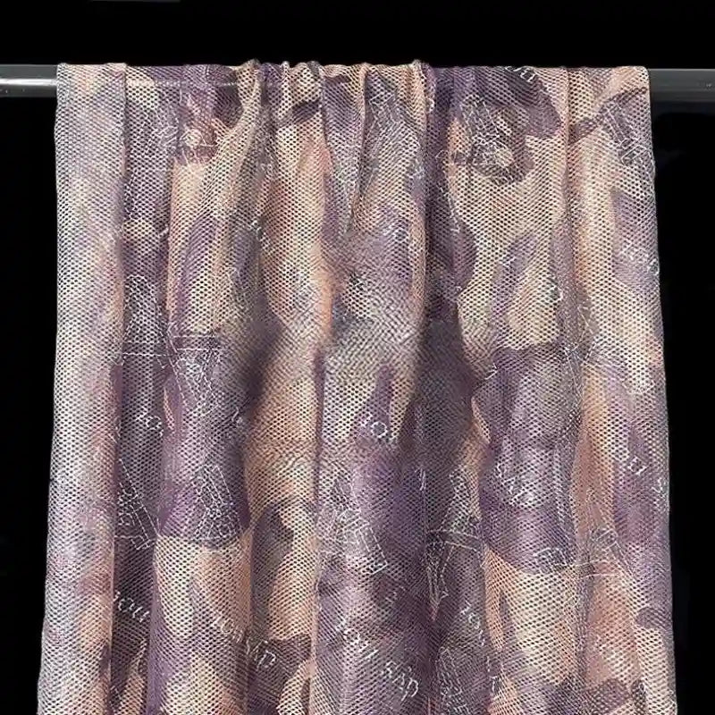 Tissu filet camouflage coloré au mètre