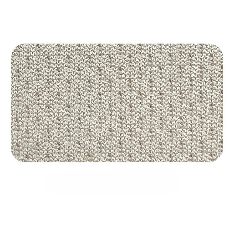 Échantillon rectangulaire de Tissu piqué nid d'abeille au mètre gris clair de Longan Craft France, un tissu anti-humidité 100 % polyester au tissage serré et texturé en nid d'abeille, présenté sur un fond blanc uni.
