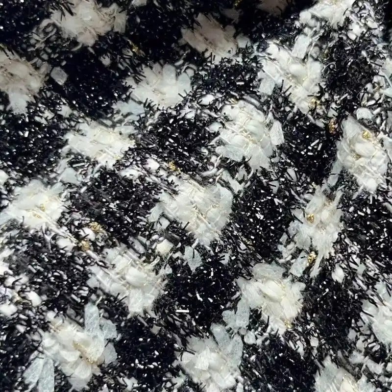 Tissu tweed noir et blanc au mètre