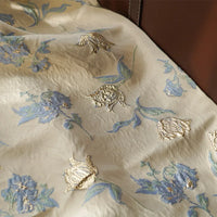 Tissu jacquard brocart fleur bleue au mètre