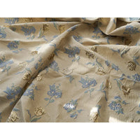 Tissu jacquard brocart fleur bleue au mètre