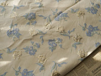 Tissu jacquard brocart fleur bleue au mètre