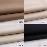 Quatre échantillons de tissu gabardine rayonne-polyester de Longan Craft France, étiquetés 108#, 109#, 110# et 116# (brun moyen, beige clair, blanc cassé, noir), idéal pour les uniformes et le bricolage.