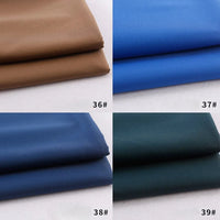 Quatre échantillons de rayonne polyester Tissu gabardine pliée de Longan Craft France sont présentés en brun (36#), bleu vif (37#), bleu foncé (38#) et vert foncé (39#) sur un fond blanc - idéal pour les uniformes de bricolage.