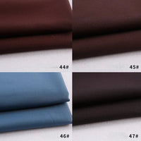 Quatre échantillons de gabardine provenant de Longan Craft France sont présentés : deux mélanges rayonne-polyester marron foncé (44#, 45#), un bleu clair (46#) et un autre marron foncé (47#), tous présentés sur une surface blanche.