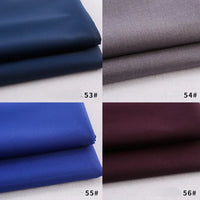 Quatre échantillons de gabardine colorée pliée de Longan Craft France (Tissu gabardine polyester épaisse) en bleu marine (53#), gris (54#), bleu royal (55#) et bordeaux (56#) sont présentés dans une grille, chacun étiqueté avec son code couleur.