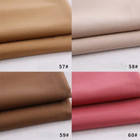 Quatre échantillons de gabardine de Longan Craft France sont présentés : en haut à gauche marron clair (57#), en haut à droite beige (58#), en bas à gauche marron foncé (59#), et en bas à droite rose (60#). Polyester-rayon épais, idéal pour les uniformes ou le bricolage.