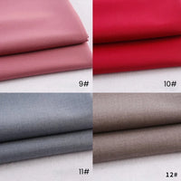 Quatre échantillons pliés de tissu gabardine Longan Craft France (polyester/rayon) - rose (9#), rouge (10#), gris (11#) et marron clair (12#) - sont disposés dans une grille 2x2 sur un fond clair. Parfait pour les uniformes de bricolage.