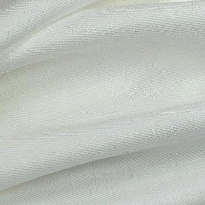 Gros plan sur le Tissu lyocell sergé coloré de Longan Craft France : 100% lyocell durable, plis doux, texture lisse et légèrement brillante, idéal pour des costumes confortables.