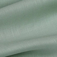 Gros plan sur le Tissu lyocell sergé coloré au mètre de Longan Craft France, un textile écologique 100 % lyocell à la texture finement nervurée et aux plis souples, idéal pour des costumes confortables et durables.