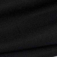 Gros plan sur le Tissu lyocell sergé coloré au mètre de Longan Craft France, dont la surface est nervurée et texturée. Ce tissu 100% lyocell durable est doux, confortable et idéal pour les costumes.