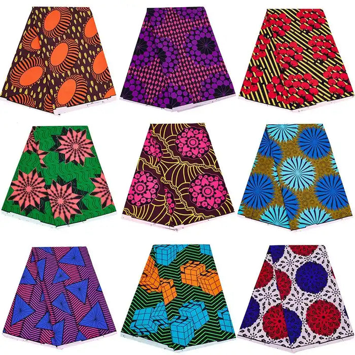 Neuf jupes A-line disposées dans une grille de 3x3, chacune présentant des motifs géométriques ou floraux vibrants en Tissu wax africain Ankara coloré par Longan Craft France, présentant des mélanges audacieux de rouge, orange, vert, bleu, violet, noir et blanc.