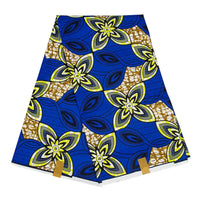 Une pièce vibrante de Longan Craft France Tissu wax africain Ankara coloré, présentant des motifs floraux audacieux jaunes, bleus et noirs avec des formes abstraites sur un fond bleu et beige - idéal pour des projets de vêtements élégants.