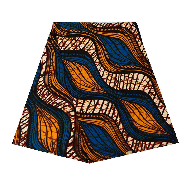 Le Longan Craft France Tissu wax africain Ankara coloré au mètre présente un motif abstrait audacieux avec des formes courbes bleues et orange soulignées de noir et de marron sur un fond blanc avec des lignes entrecroisées.