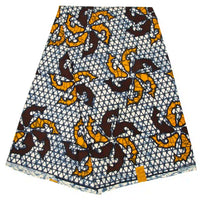 Longan Craft France Tissu wax africain Ankara, vendu au mètre : motif géométrique bleu et blanc avec formes abstraites jaunes et marron foncé, idéal pour vêtements tendance.