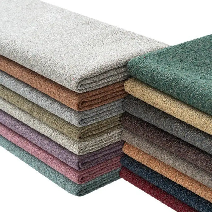 Tissu chenille à pois multicolores au mètre