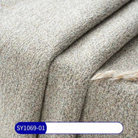 Tissu chenille à pois multicolores au mètre