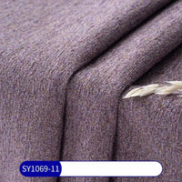 Tissu chenille à pois multicolores au mètre