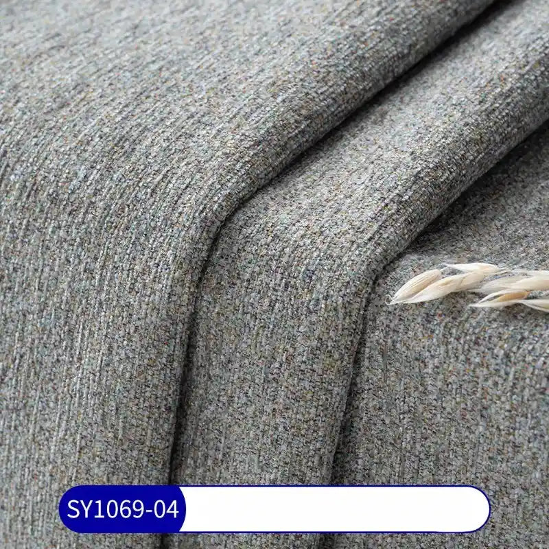 Tissu chenille à pois multicolores au mètre