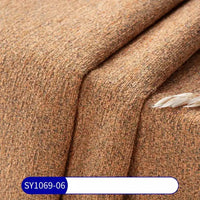 Tissu chenille à pois multicolores au mètre